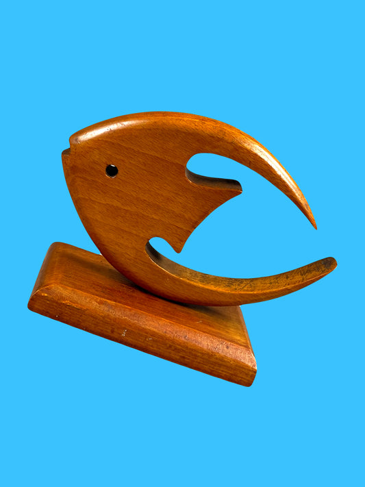 Dynamic matte wooden fish sculpture