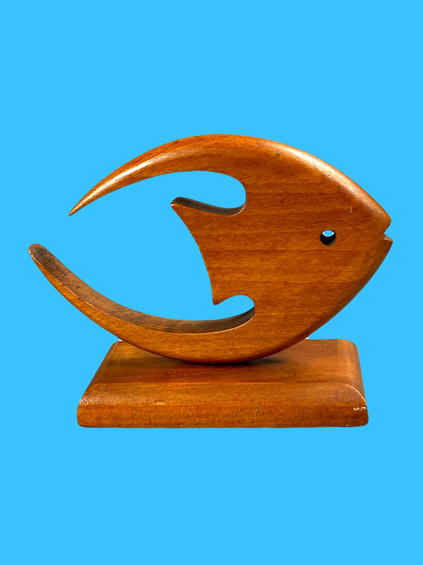 Dynamic matte wooden fish sculpture