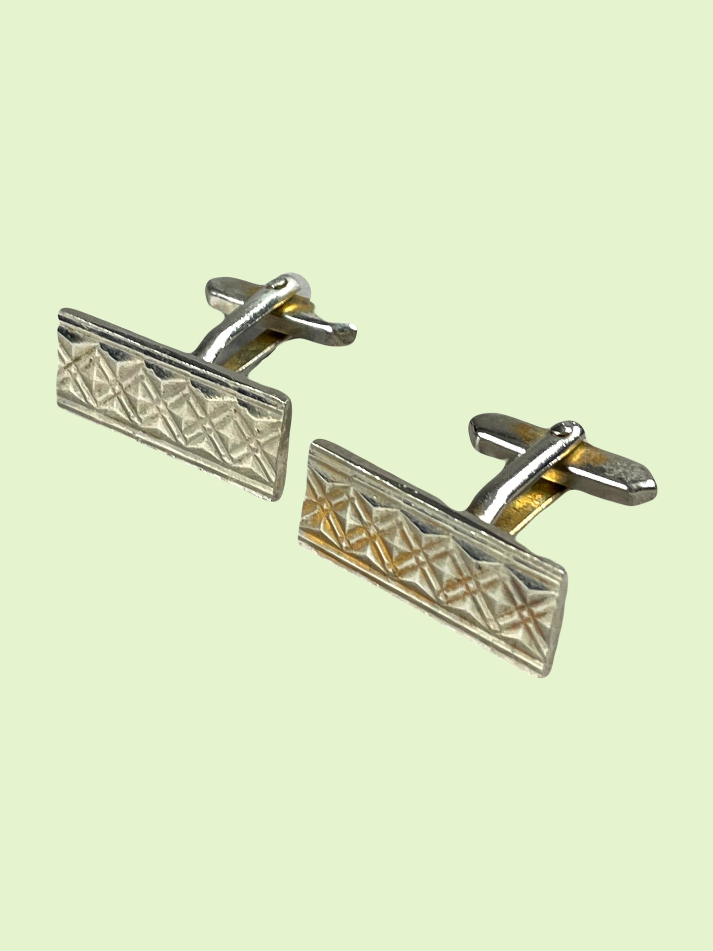 Ornamented rectangular silver metal cufflink