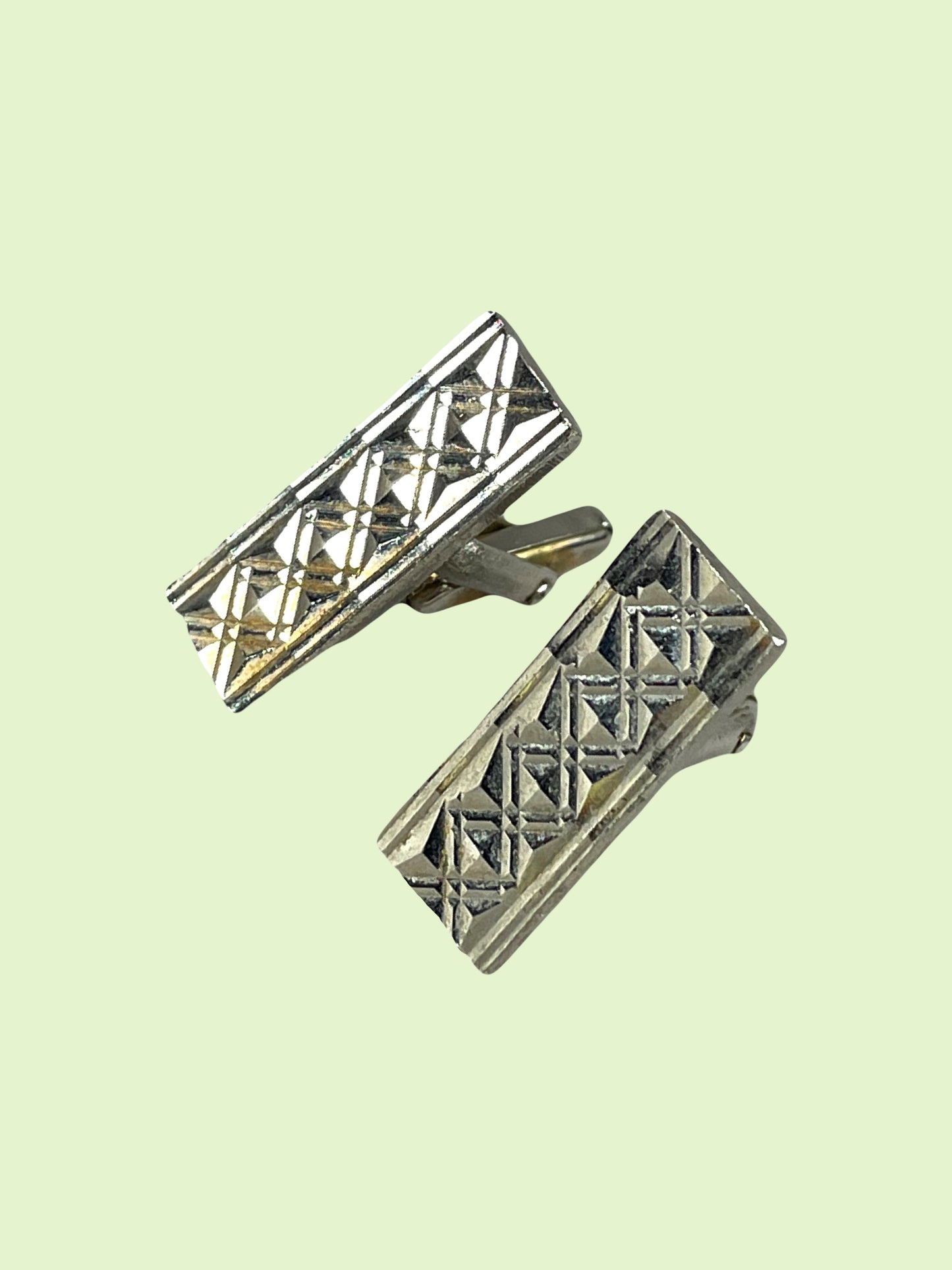 Ornamented rectangular silver metal cufflink