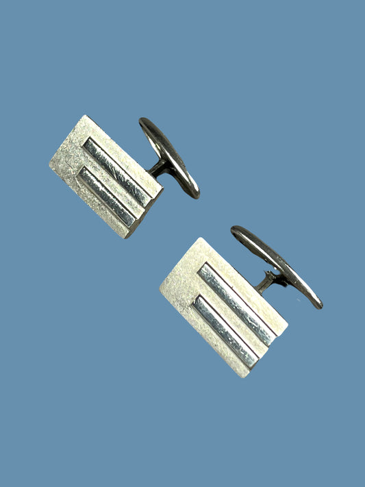 Nickel plated sleek rectangular cufflink with line design