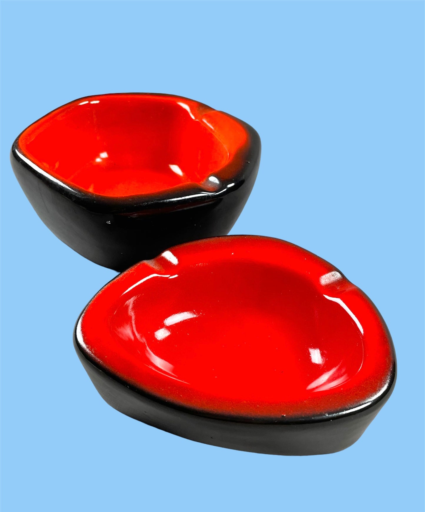 Vibrant orange ceramic ashtray