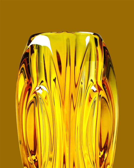 Liquid gold "Lens" pressed glass vase in sophisticated amber