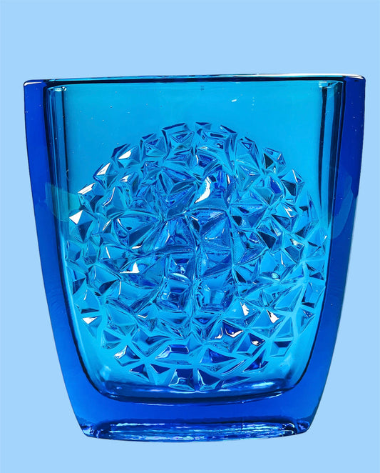 Intricate pressed glass vase in cobalt blue
