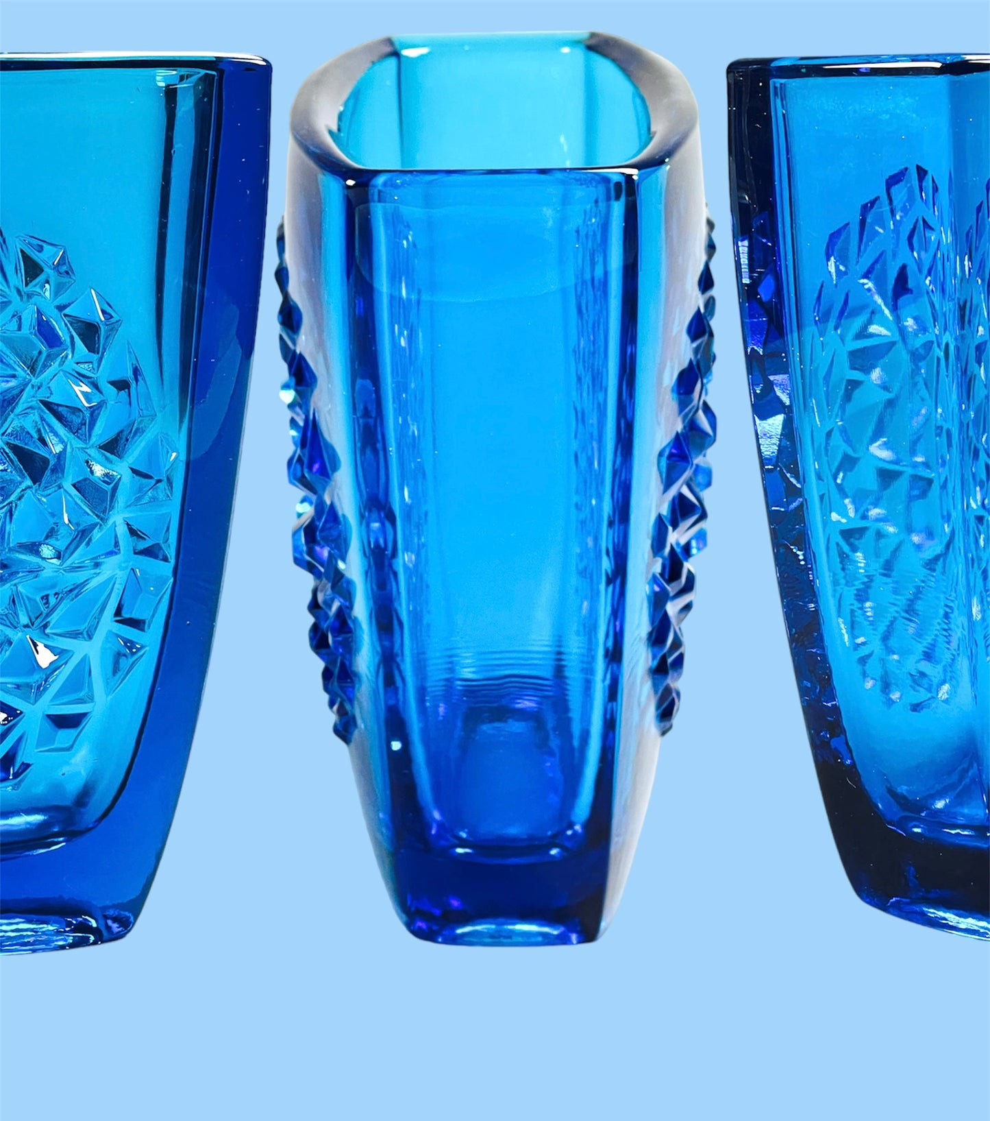 Intricate pressed glass vase in cobalt blue