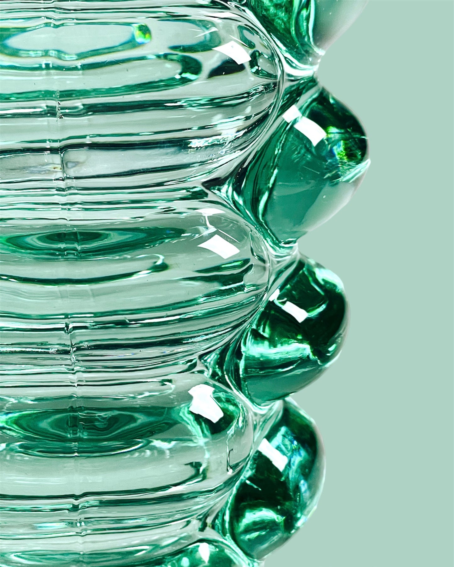 Curvy pressed glass vase in lively turquoise