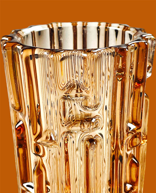 Eye-catching rose gold pressed glass vase