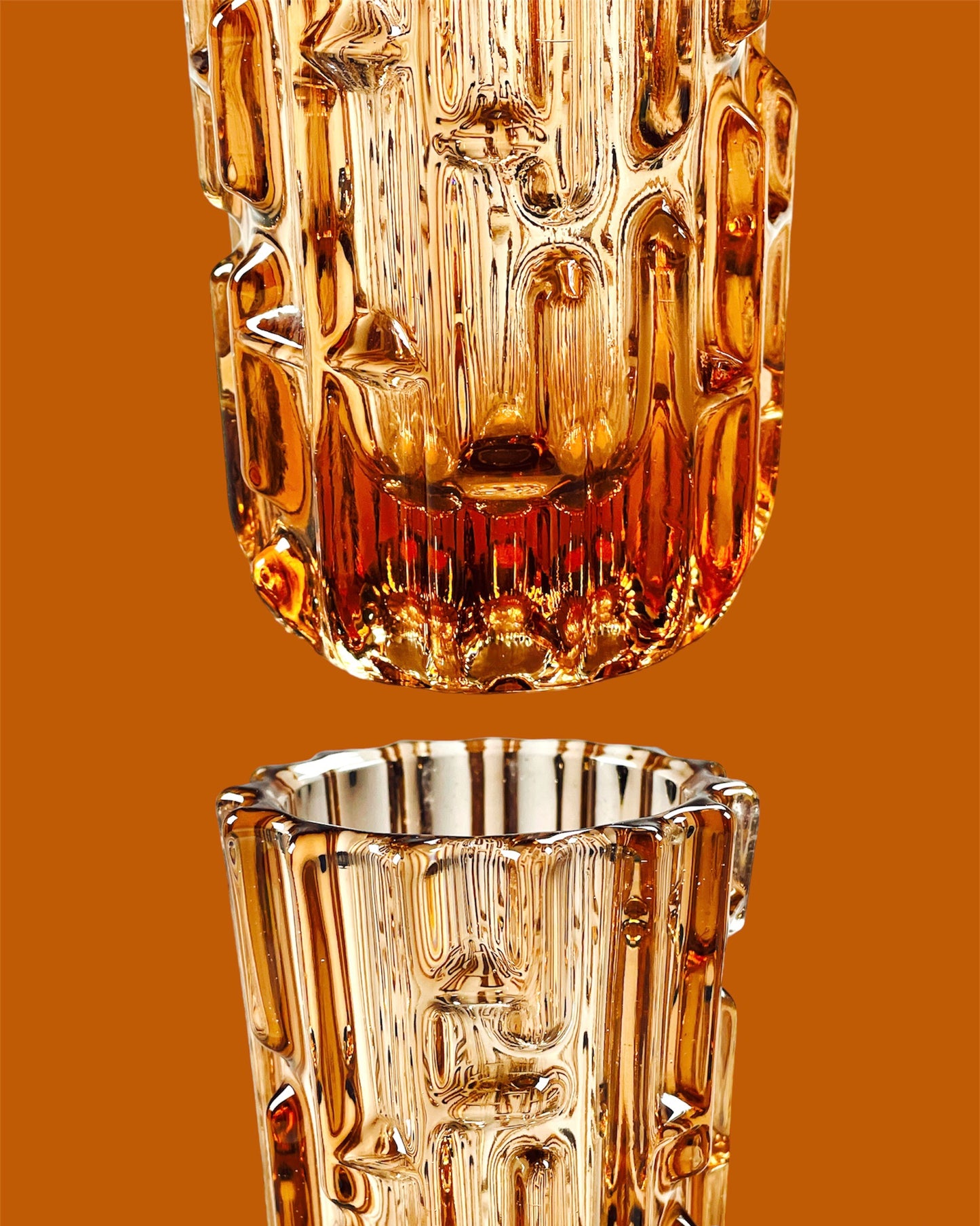 Eye-catching rose gold pressed glass vase